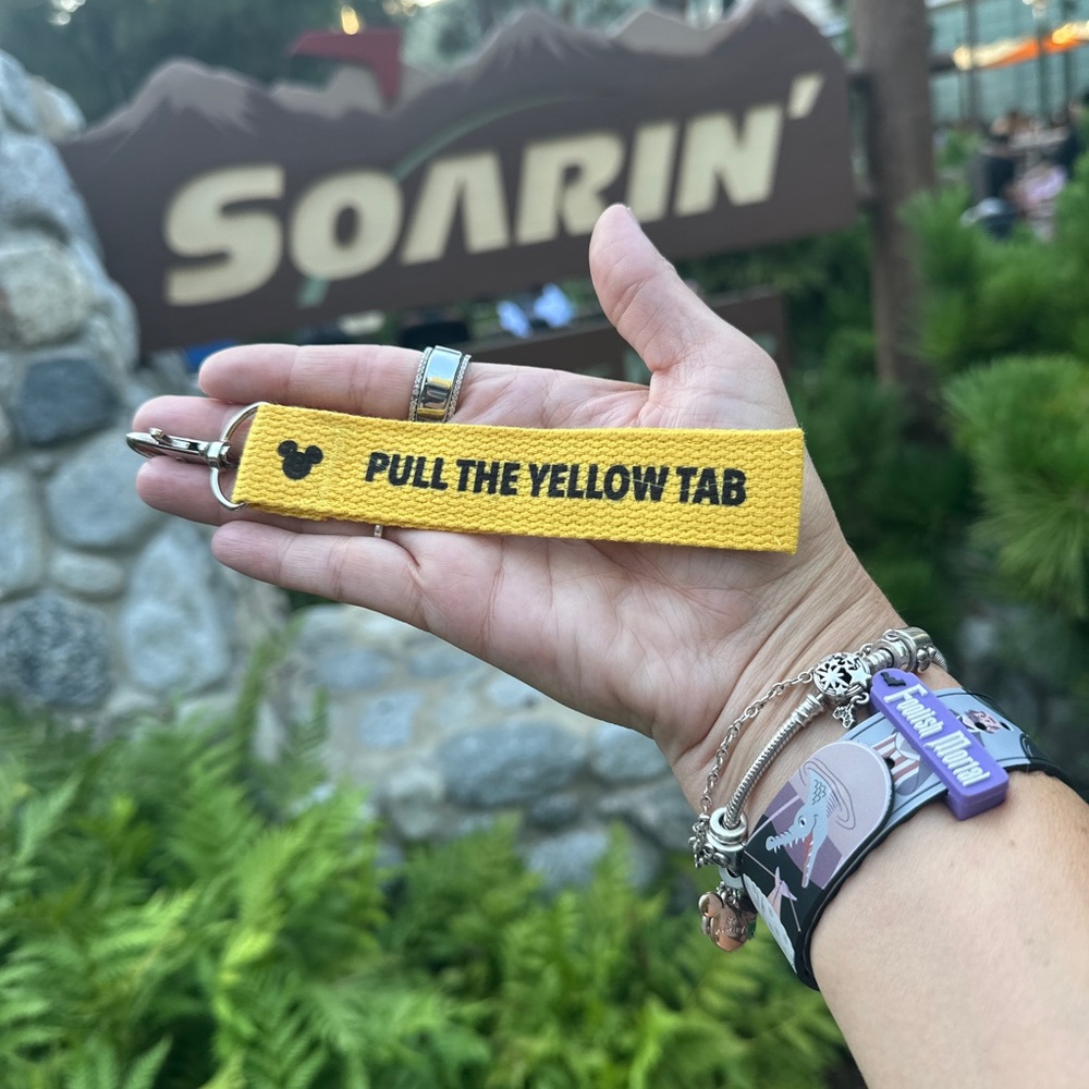 Pull the yellow tab keychain